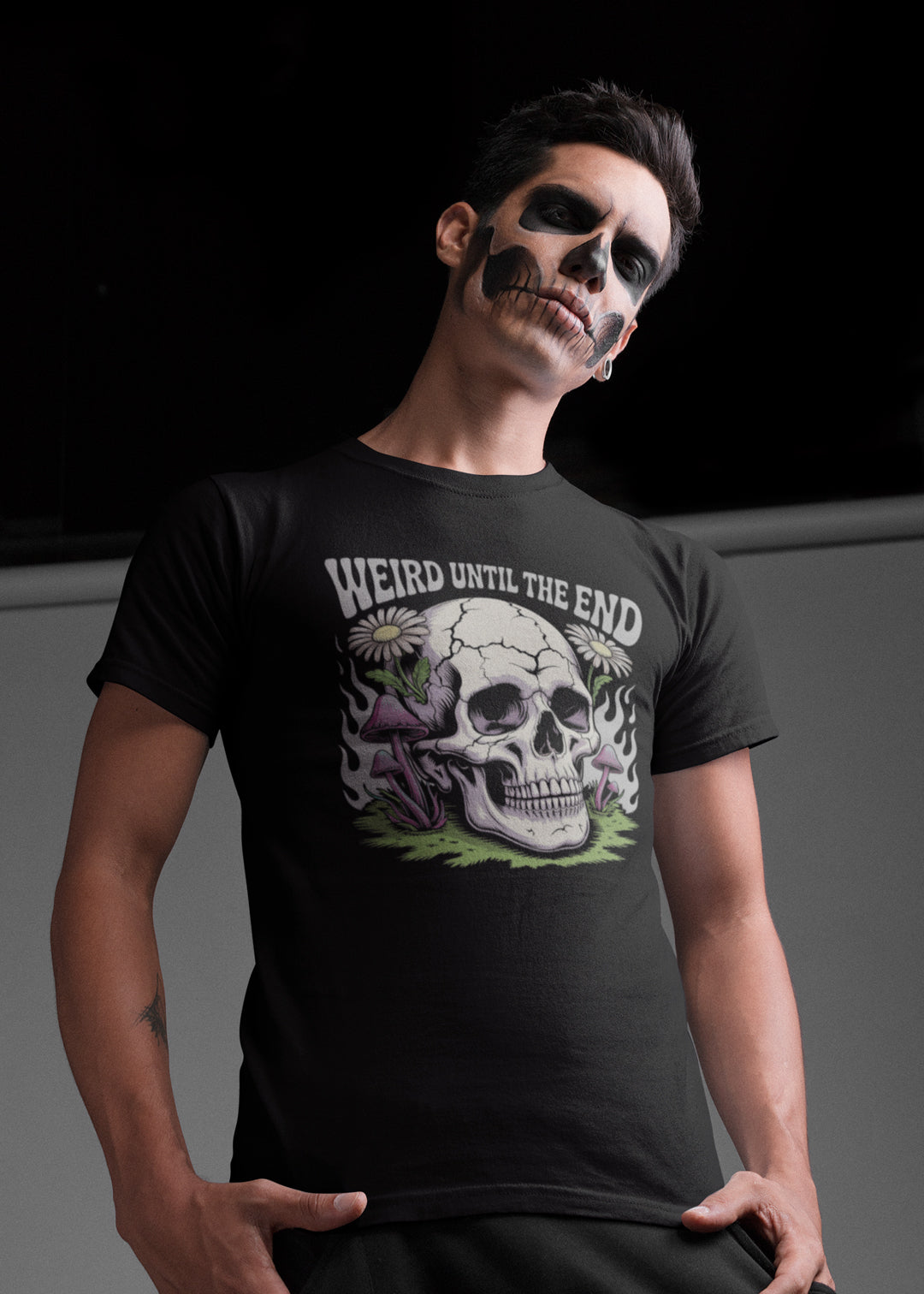 Oversized black psychedelic skull t-shirt with “Weird Until The End” text, featuring trippy mushroom and floral graphic design – unisex gothic streetwear for men and women from Opium Valley.
