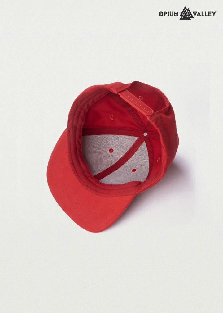 Red snapback cap featuring bold psychedelic artwork and streetwear styling – Opiumvalley headwear collection